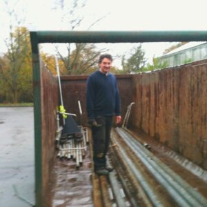 We are removing a lot of the old pipe heating from the glasshouse. Here is Gary providing a sense of scale for the skip and pipes #bigandheavy